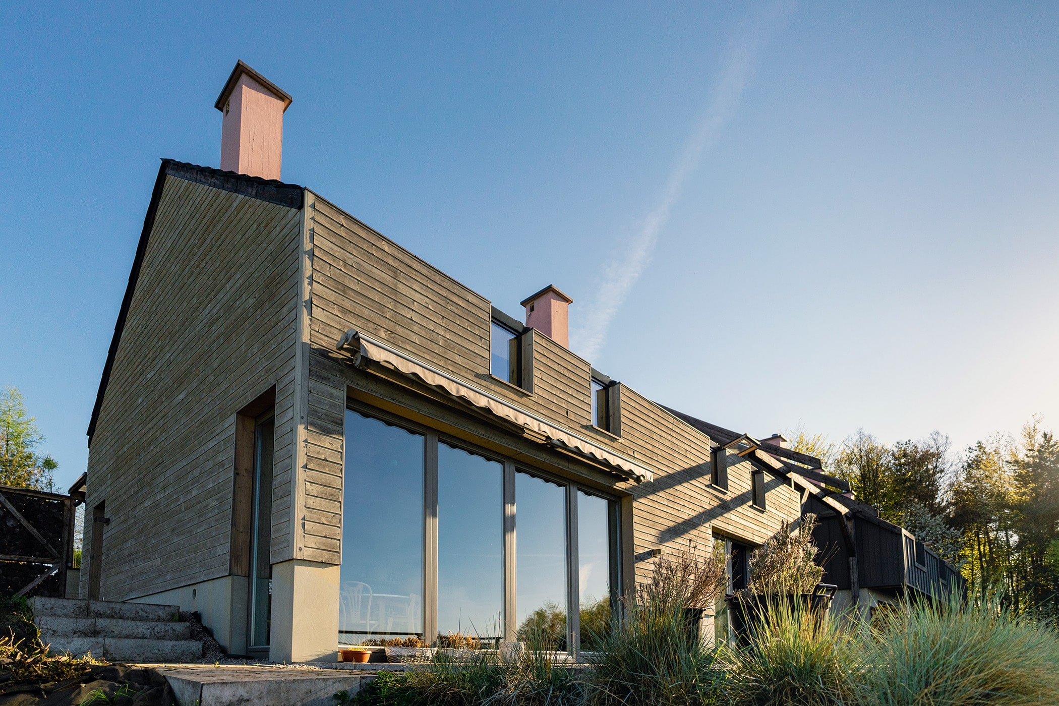 Construction d'une maison en bois par un architecte